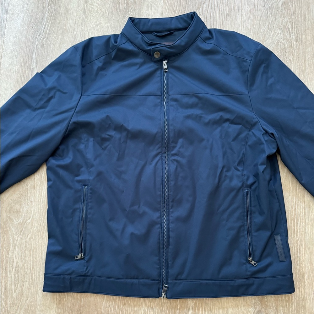 Navy blue lightweight jacket with a zipper